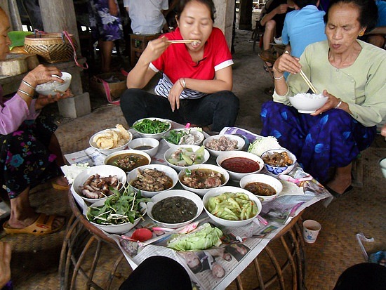 Thai family eating
